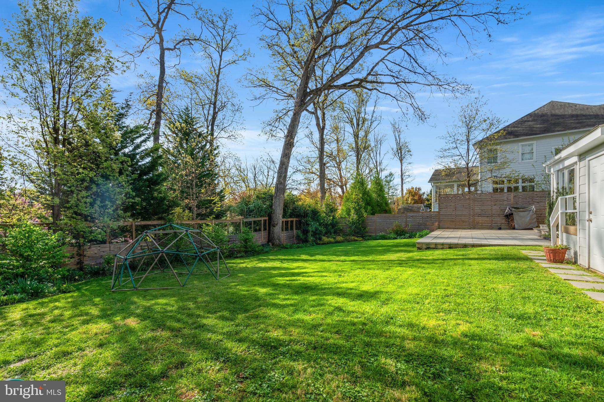 6219 Arkendale Road Alexandria, VA 22307 - Photo 30 of 33 a backyard of a house with table and chairs