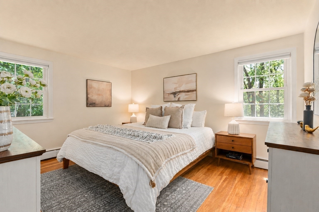 11 Longmeadow Road Medfield, MA 02052 - Photo 13 of 39 a bedroom with a bed and a window