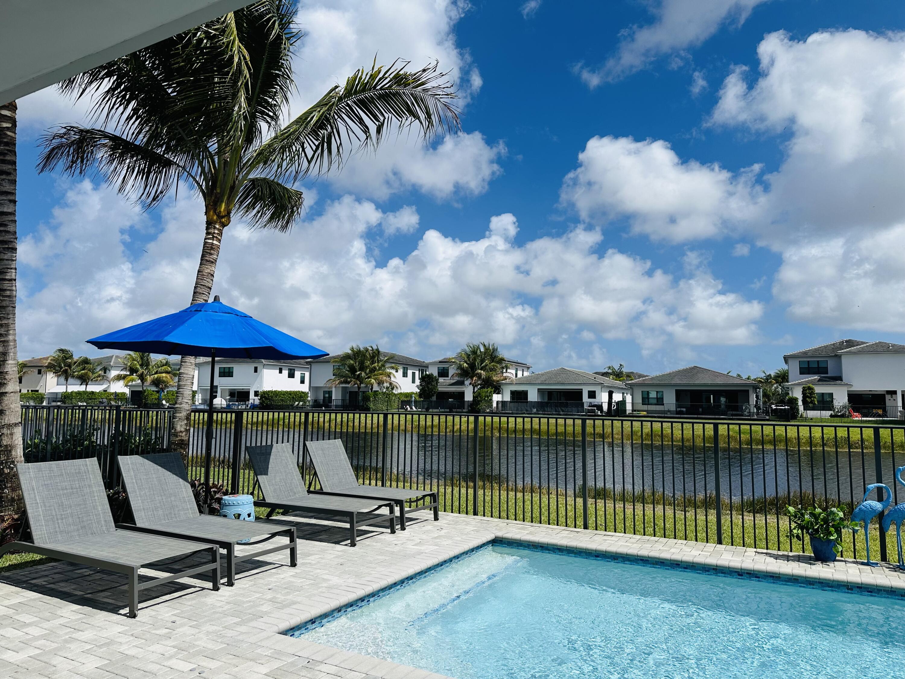 8537 Apple Falls Lane Boca Raton, FL 33496 - Photo 38 of 58 POOL & LAKE VIEW