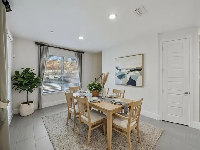 a bathroom with a bathtub shower sink and toilet