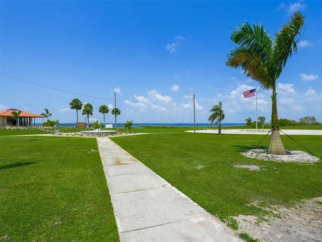 a view of yard with lake and green space