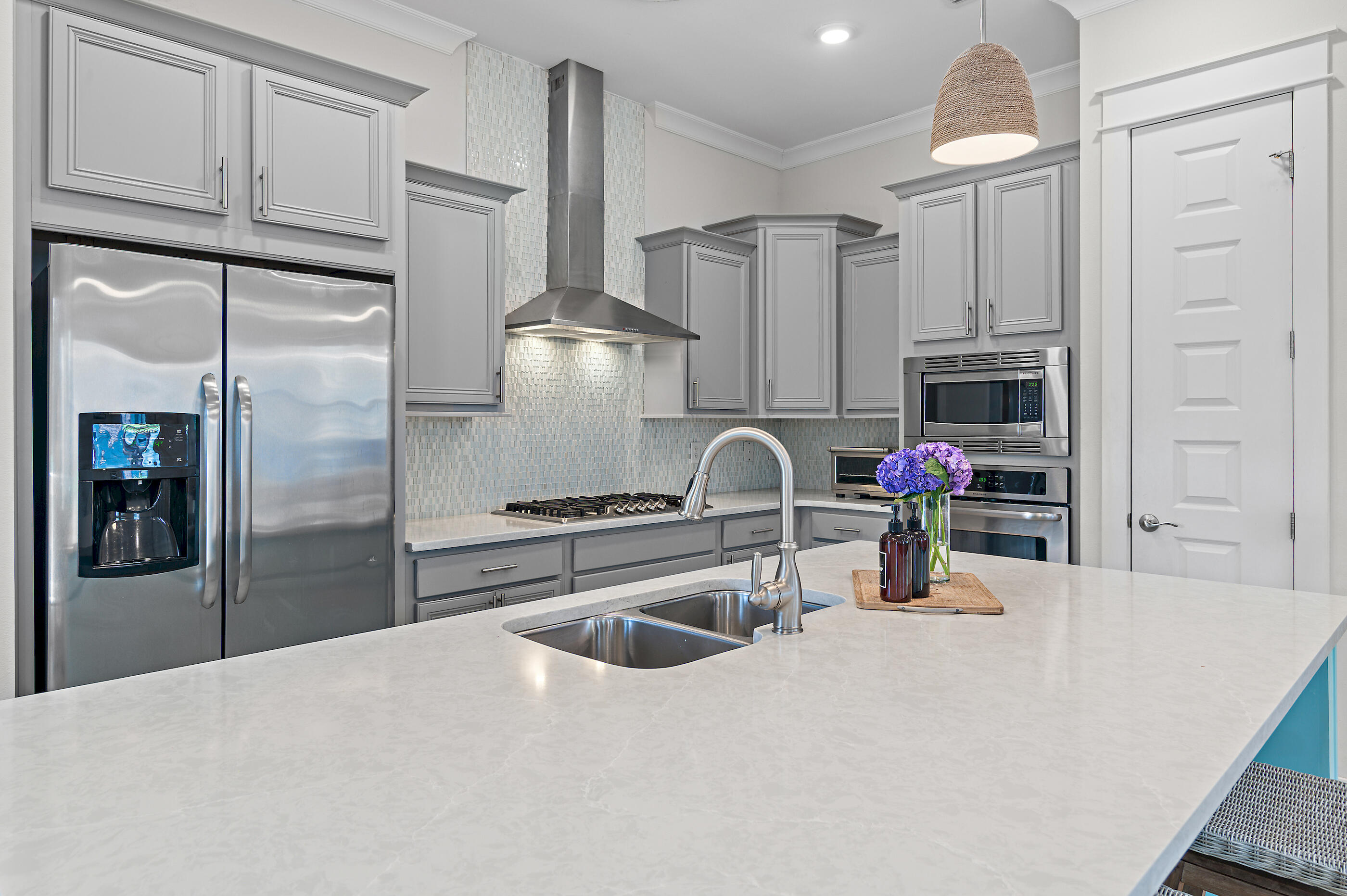 64 West W Pine, Unit A Inlet Beach, FL 32461 - Photo 11 of 61 a kitchen with granite countertop a refrigerator sink and stove