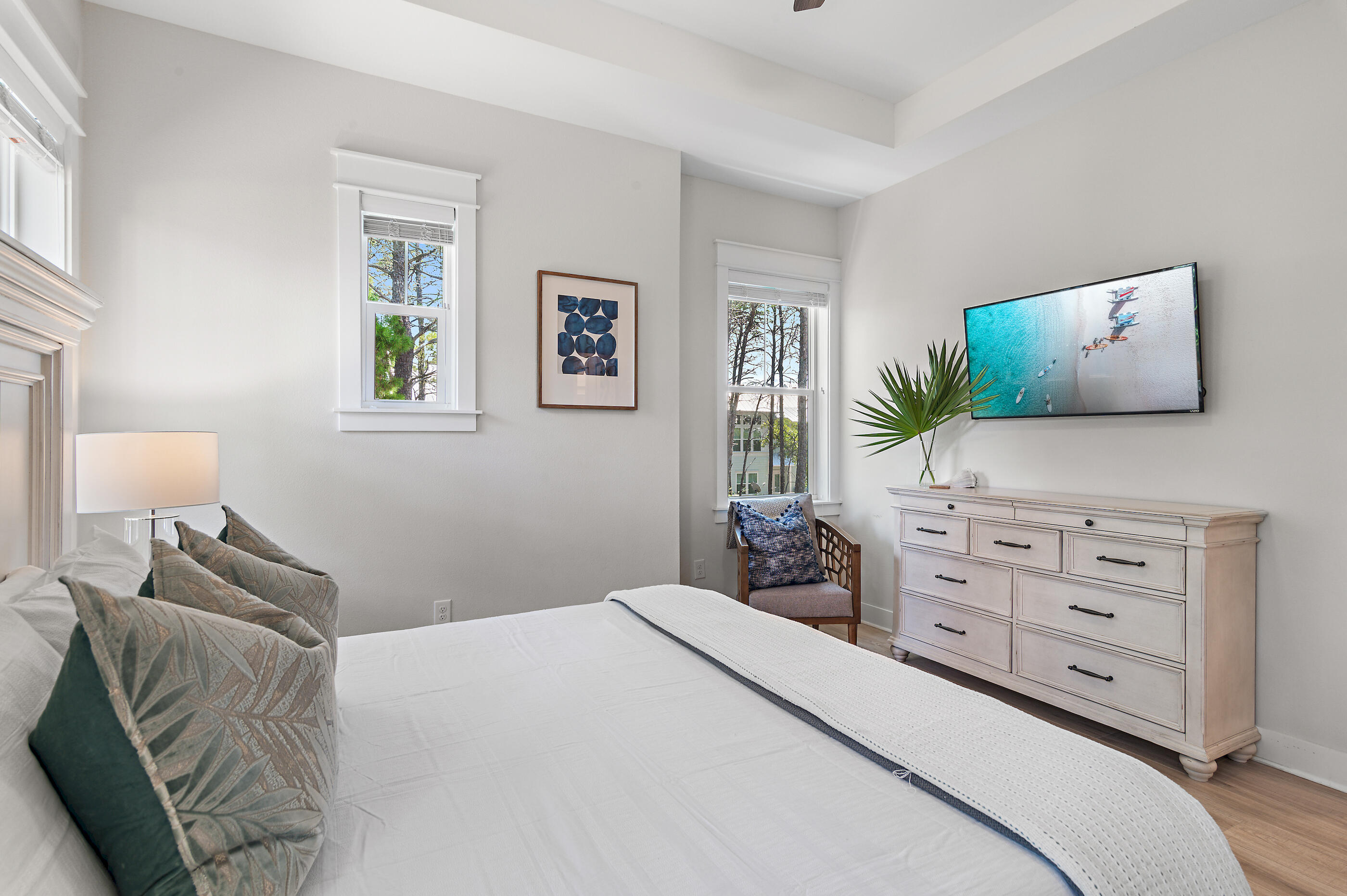 64 West W Pine, Unit A Inlet Beach, FL 32461 - Photo 15 of 61 a bedroom with a bed and a flat screen tv