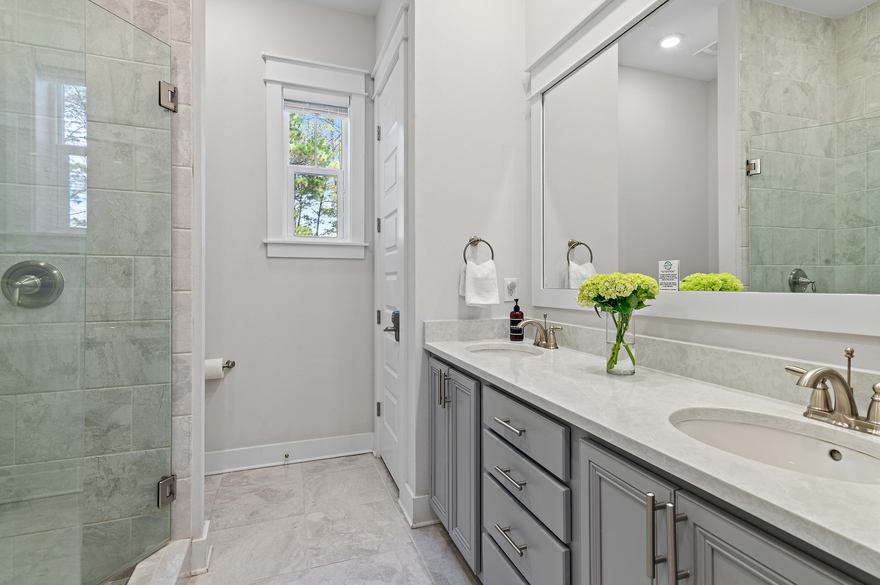 64 West W Pine, Unit A Inlet Beach, FL 32461 - Photo 16 of 61 a bathroom with a sink and a mirror