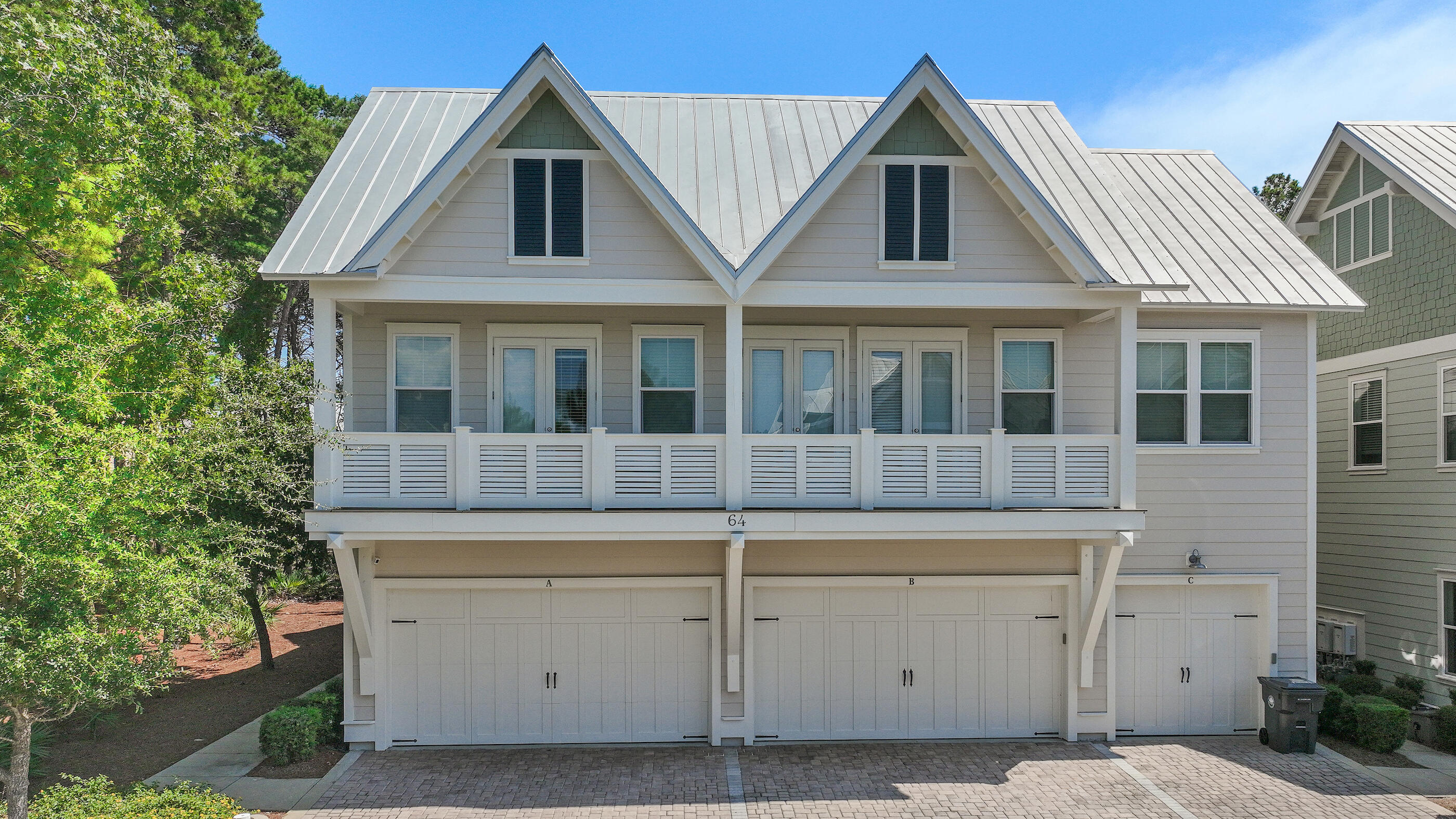 64 West W Pine, Unit A Inlet Beach, FL 32461 - Photo 2 of 61 a view of a house with garage