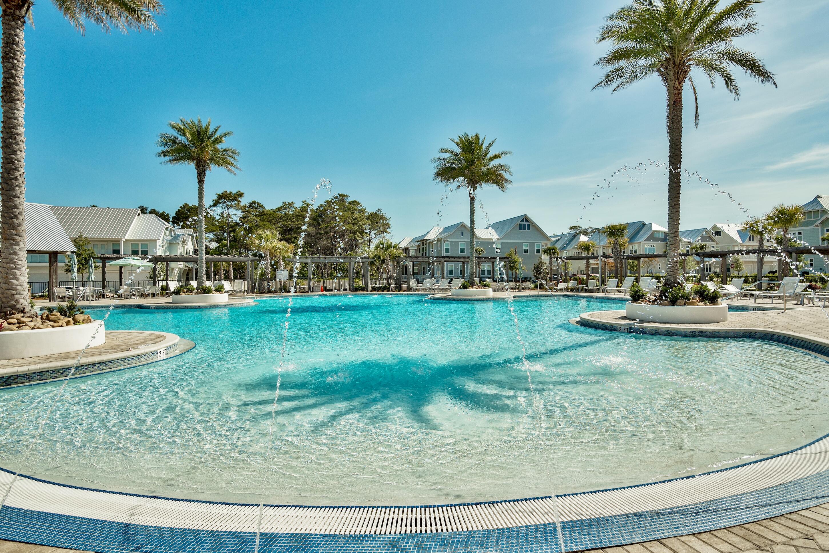 64 West W Pine, Unit A Inlet Beach, FL 32461 - Photo 28 of 61 a view of a lake with palm trees