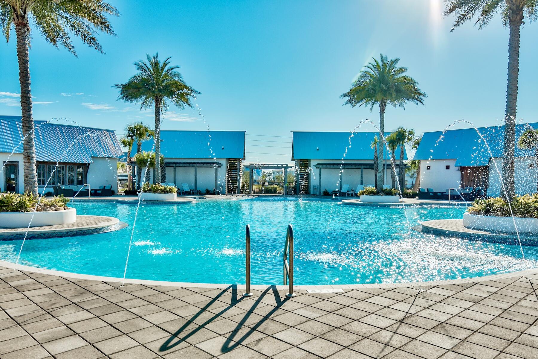 64 West W Pine, Unit A Inlet Beach, FL 32461 - Photo 30 of 61 a front view of house with yard and outdoor seating
