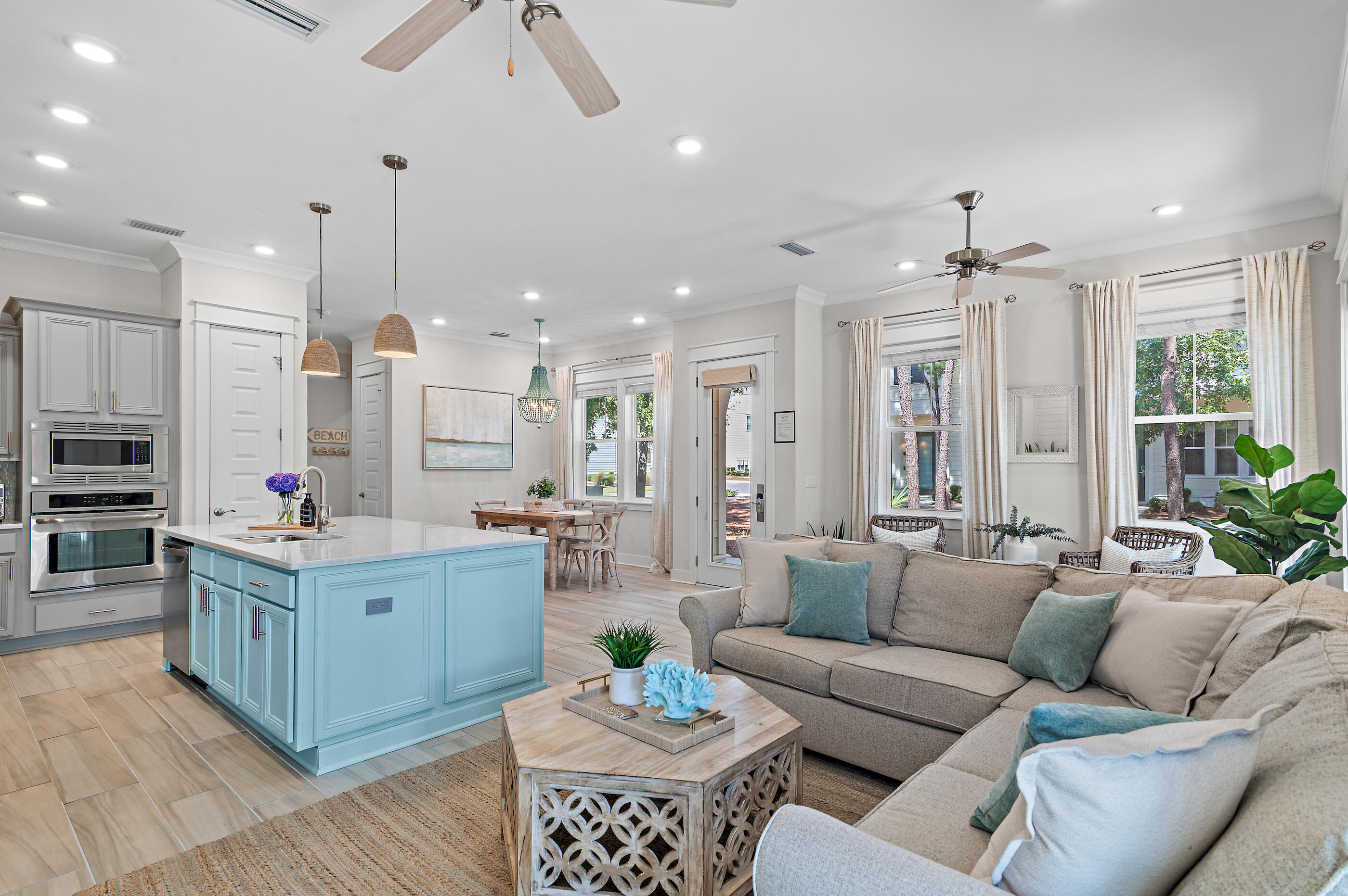 64 West W Pine, Unit A Inlet Beach, FL 32461 - Photo 7 of 61 a living room with furniture kitchen area and a chandelier