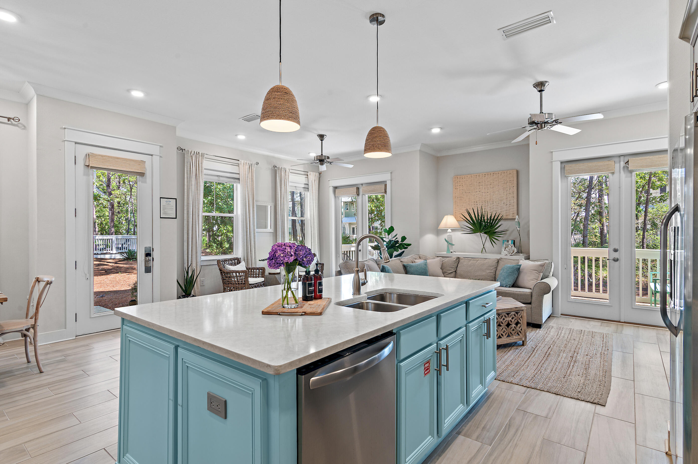 64 West W Pine, Unit A Inlet Beach, FL 32461 - Photo 9 of 61 a view of a dining room and livingroom with furniture wooden floor a chandelier