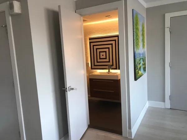 a view of kitchen and front door