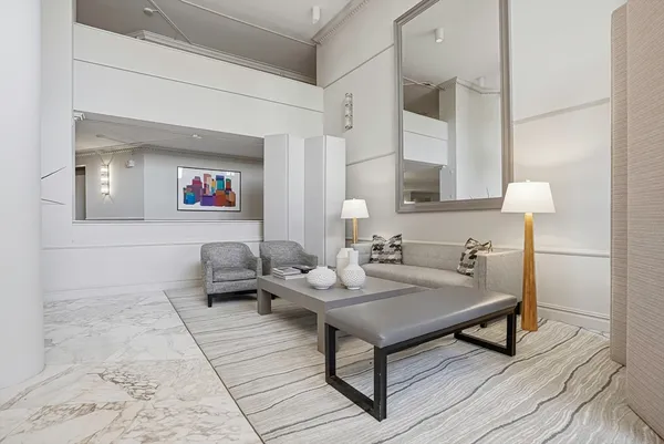 a living room with furniture and a table