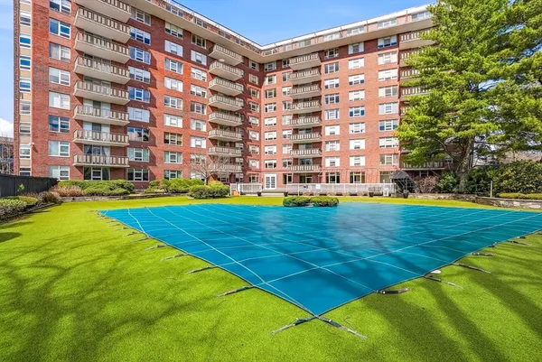 a view of a building with a big yard