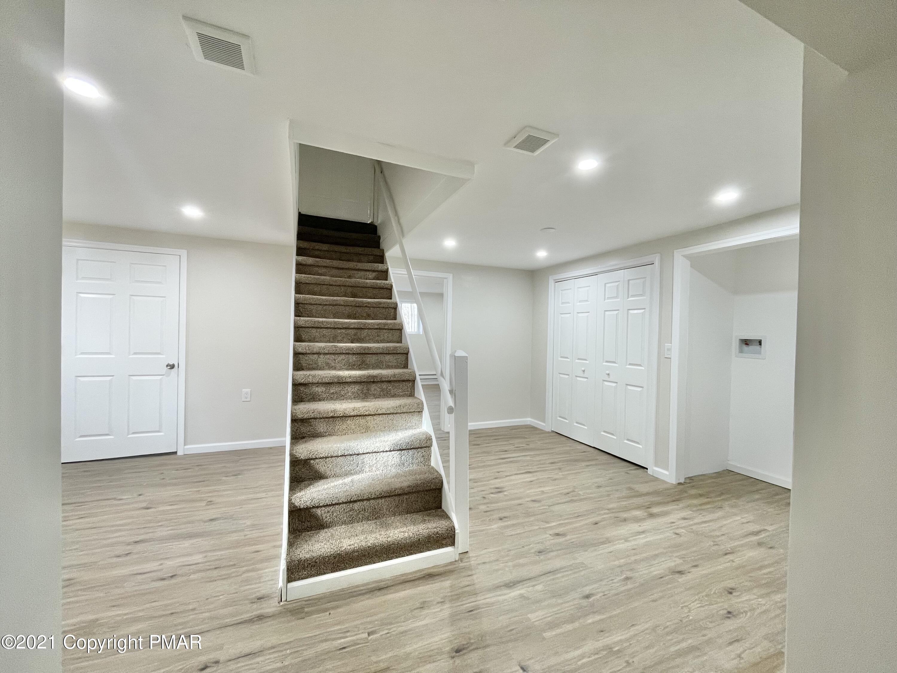 128 Ashley Court Bushkill, PA 18324 - Photo 26 of 87 Basement Staircase