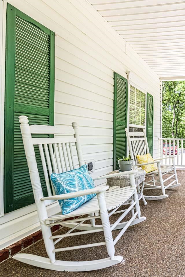 2942 Dunlap Orphanage Road Brighton, TN 38011 - Photo 4 of 25 Enjoy your days sittin in the rocking chairs or swinging on the front porch swing while watching the wildlife and the view of your own private 2-acre pond.