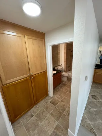 a bathroom with a toilet a sink and bathtub