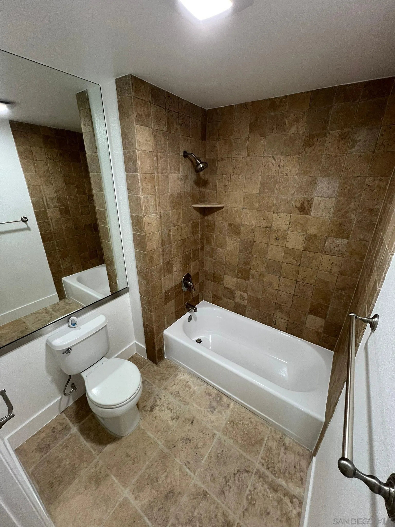 9860 Dale Avenue, Unit D8 Spring Valley, CA 91977 - Photo 8 of 19 a bathroom with a toilet a sink and bathtub