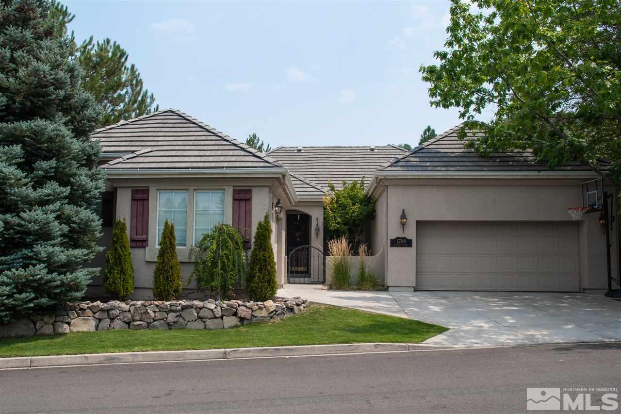 1700 Hunter Creek Road Reno, NV 89519 - Photo 1 of 25 a front view of a house with garden