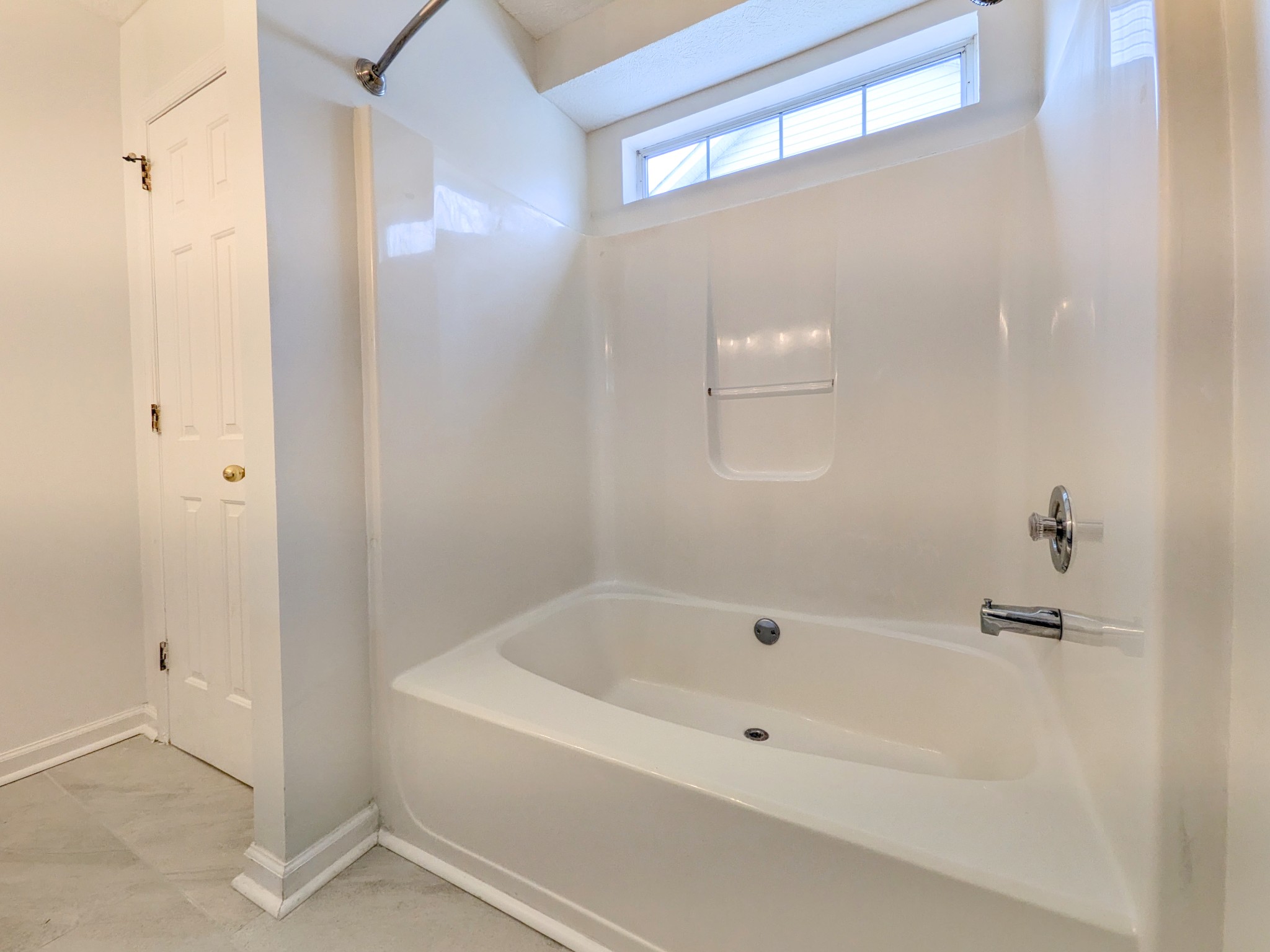 2544 Johnson Ridge Road Antioch, TN 37013 - Photo 14 of 30 a white bath tub sitting next to a shower