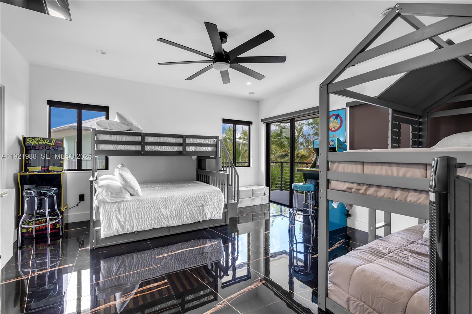 32 North Bounty Lane Key Largo, FL 33037 - Photo 18 of 86 a bed room with a bed and a ceiling fan