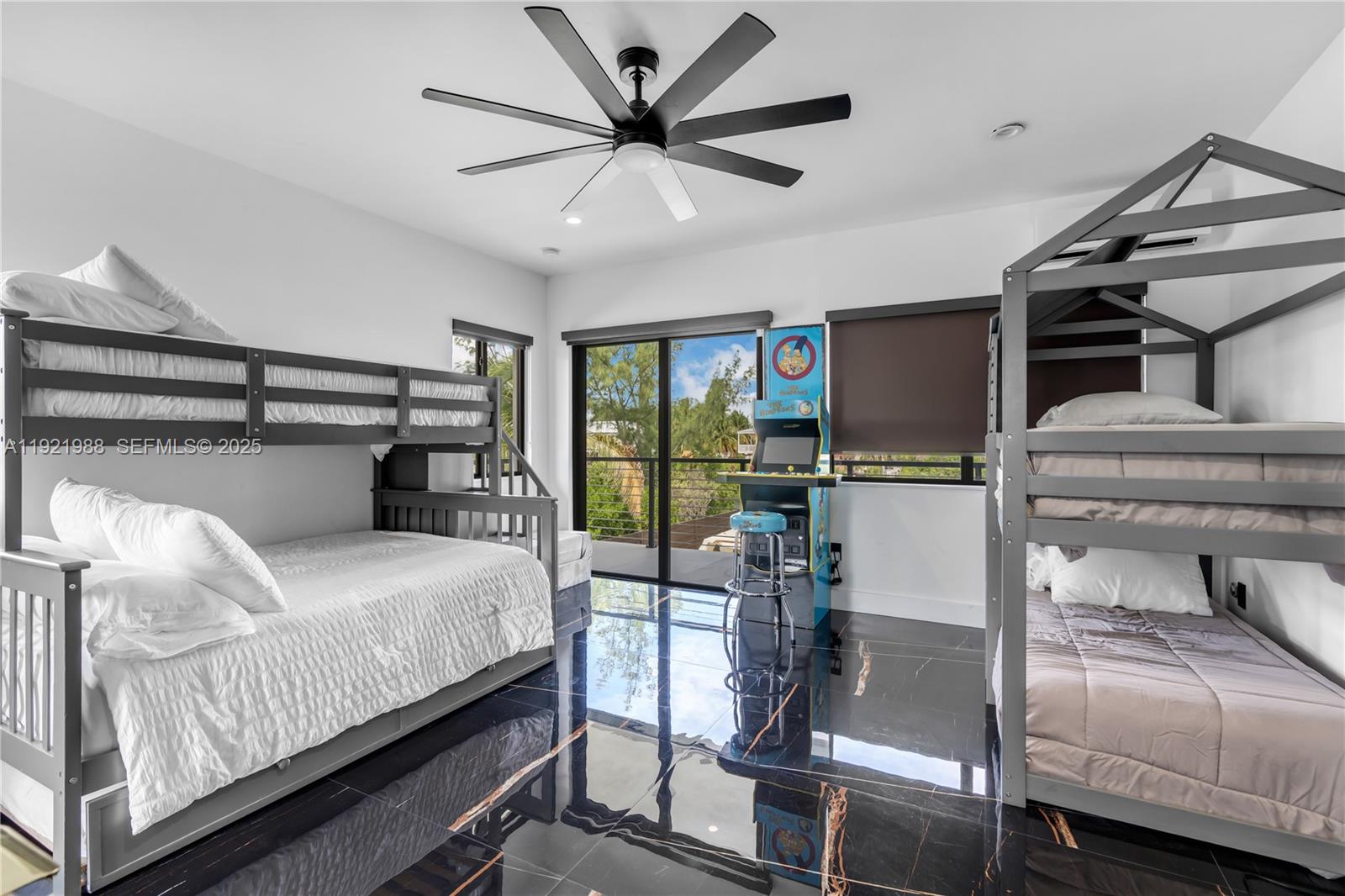 32 North Bounty Lane Key Largo, FL 33037 - Photo 19 of 86 a bedroom with a bed and large windows