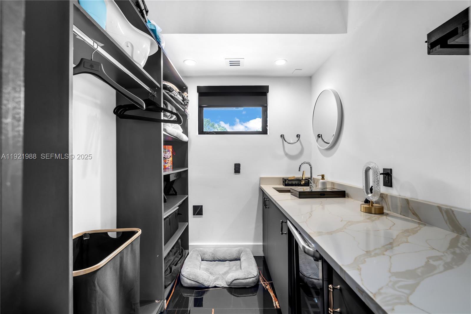 32 North Bounty Lane Key Largo, FL 33037 - Photo 20 of 86 a kitchen with stainless steel appliances granite countertop a sink a stove and a refrigerator