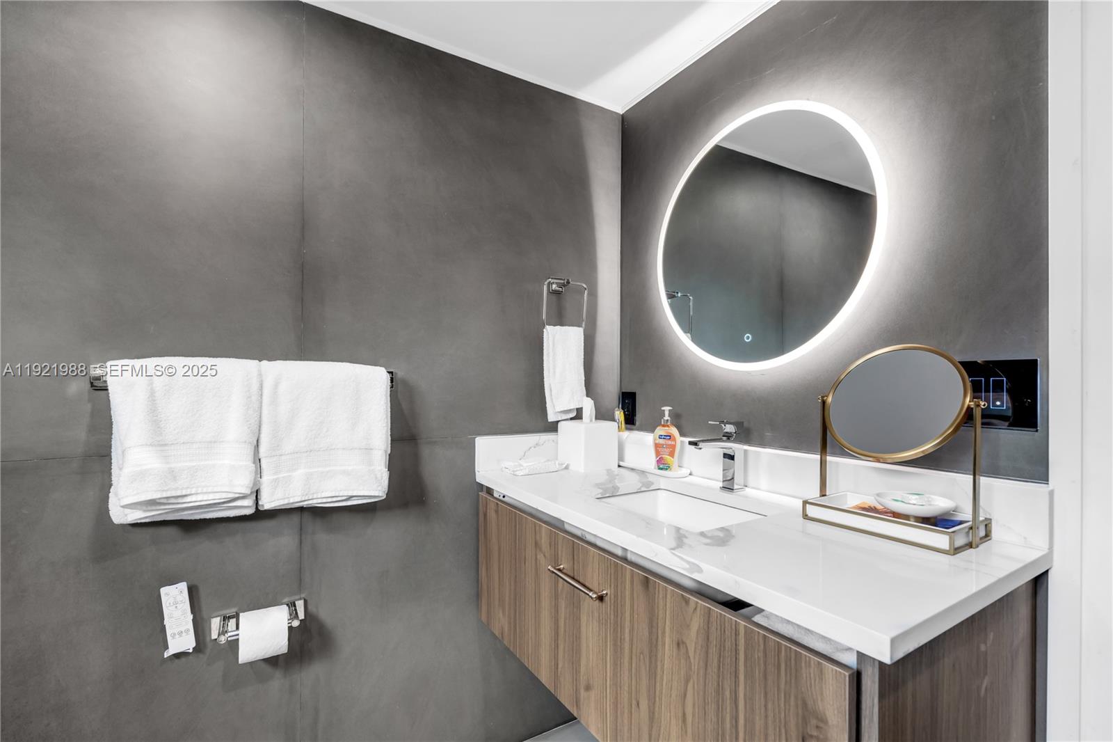 32 North Bounty Lane Key Largo, FL 33037 - Photo 25 of 86 a bathroom with a sink and a mirror