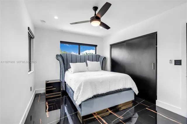 a view of a lake with a house in the background