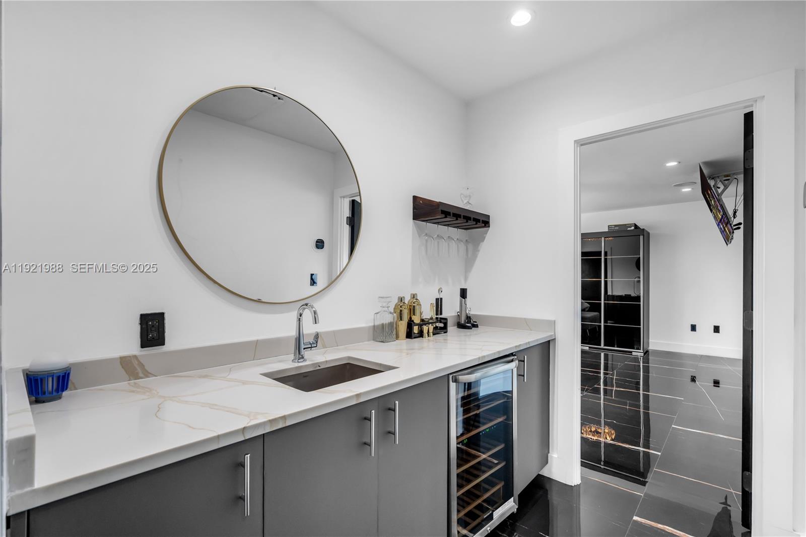 32 North Bounty Lane Key Largo, FL 33037 - Photo 40 of 86 a bathroom with a sink and a mirror
