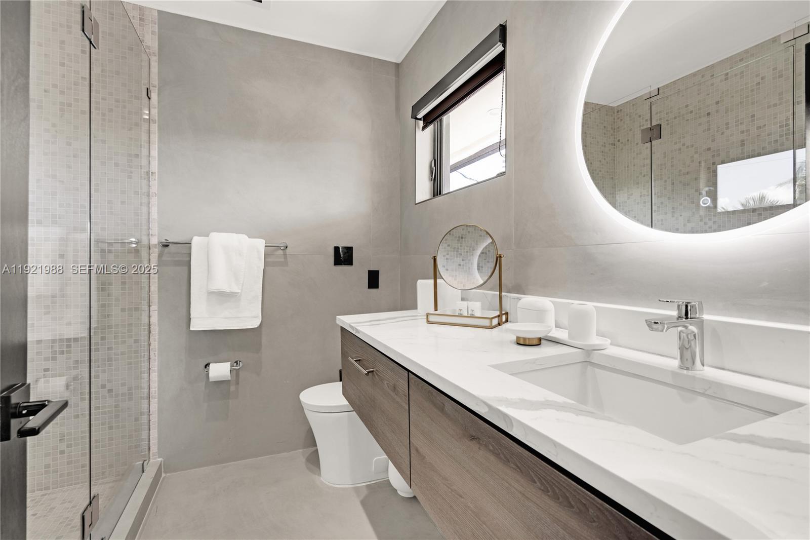 32 North Bounty Lane Key Largo, FL 33037 - Photo 44 of 86 a bathroom with a sink and a mirror