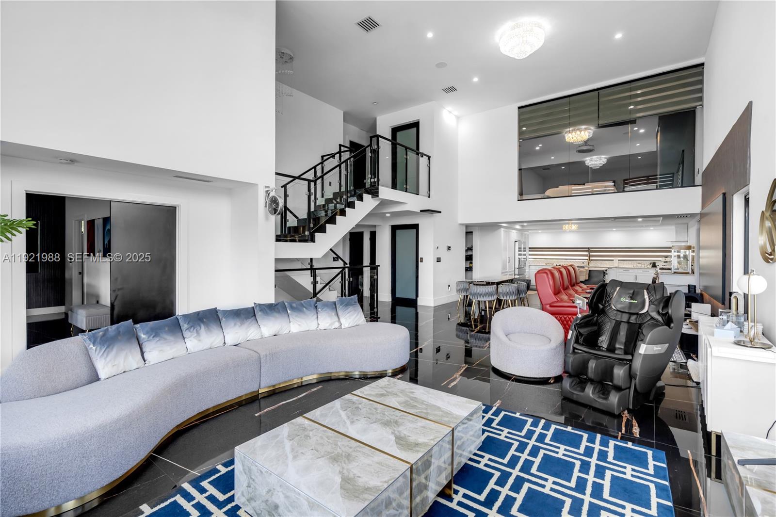32 North Bounty Lane Key Largo, FL 33037 - Photo 6 of 86 a living room with lots of furniture and wooden floor