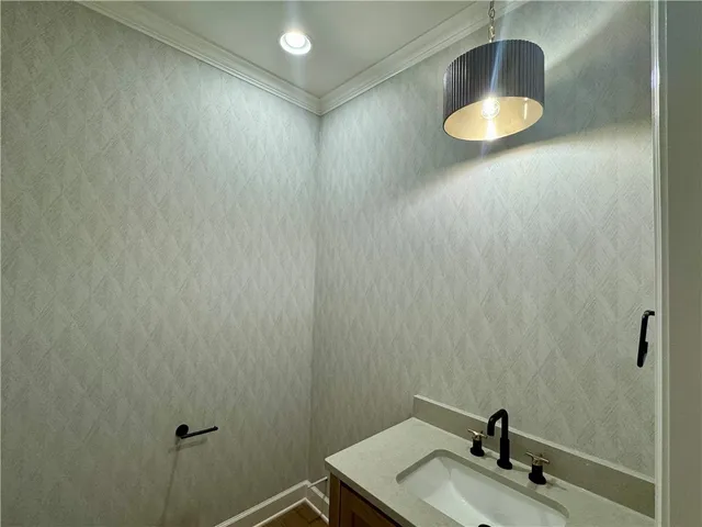 a view of a backyard with a wooden fence