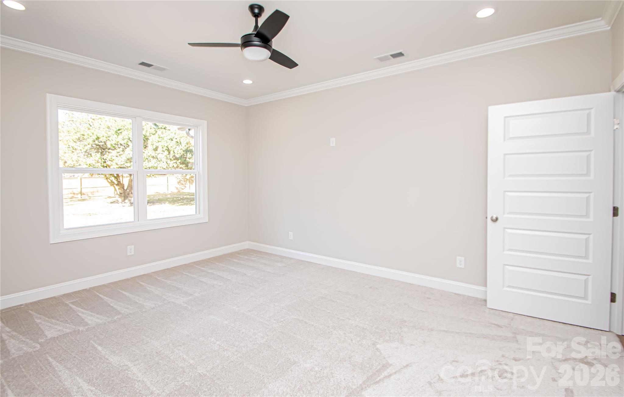 1508 Marion Street Monroe, NC 28112 - Photo 25 of 48 a view of an empty room with a window