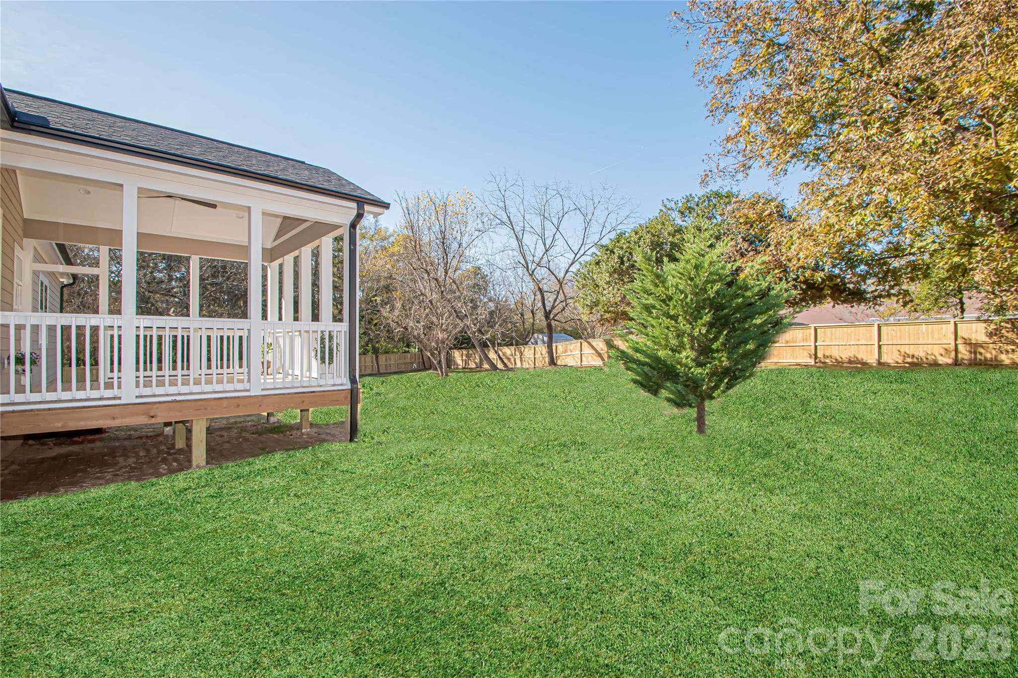 1508 Marion Street Monroe, NC 28112 - Photo 46 of 48 a view of a house with backyard and a tree