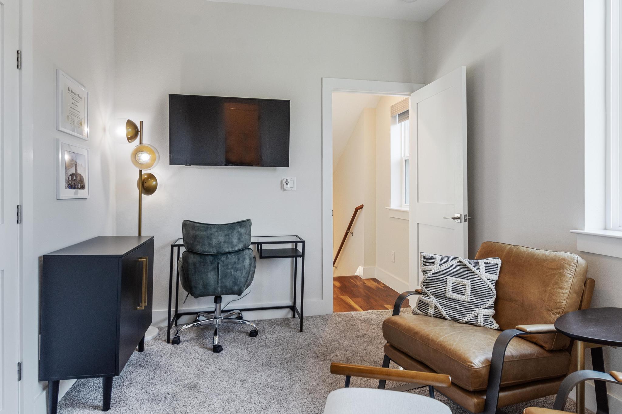 1177 Pandora Street, Unit B Austin, TX 78702 - Photo 15 of 30 Office space featuring baseboards and wood finished floors