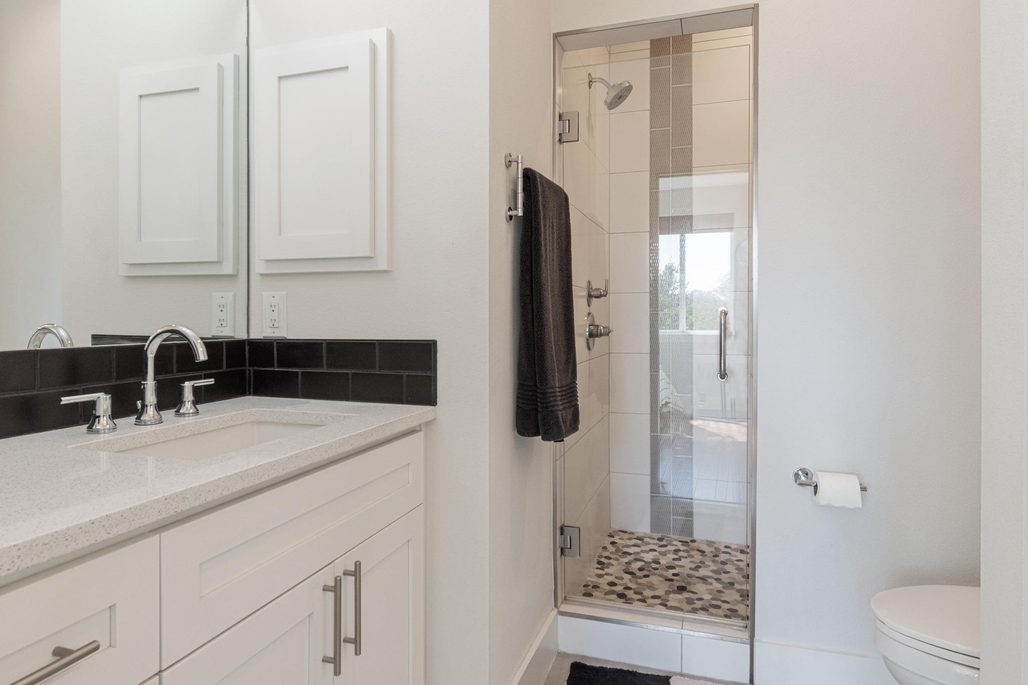 1177 Pandora Street, Unit B Austin, TX 78702 - Photo 19 of 30 Full bathroom featuring vanity and a stall shower