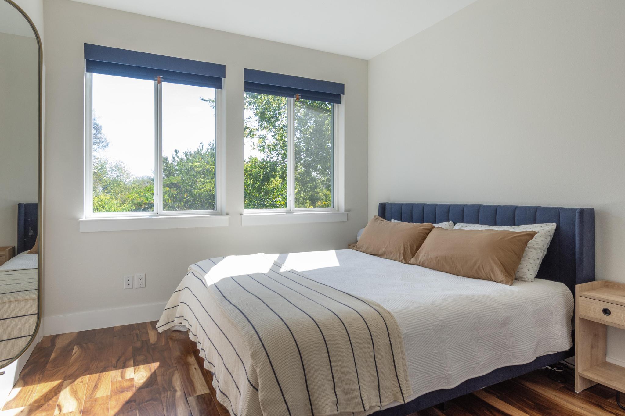 1177 Pandora Street, Unit B Austin, TX 78702 - Photo 20 of 30 Bedroom with wood finished floors and baseboards