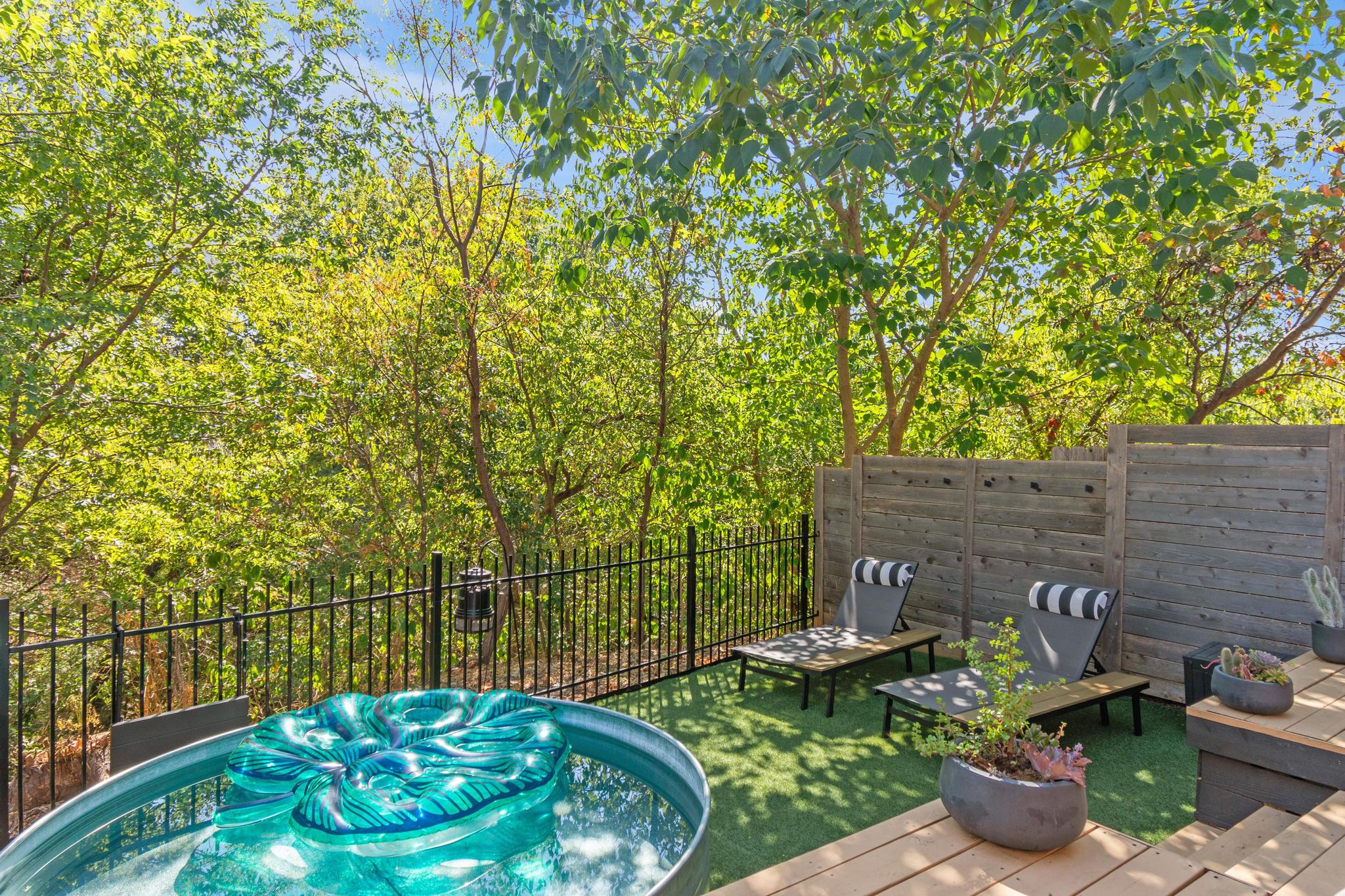1177 Pandora Street, Unit B Austin, TX 78702 - Photo 23 of 30 View of pool featuring a deck and a swimming pool