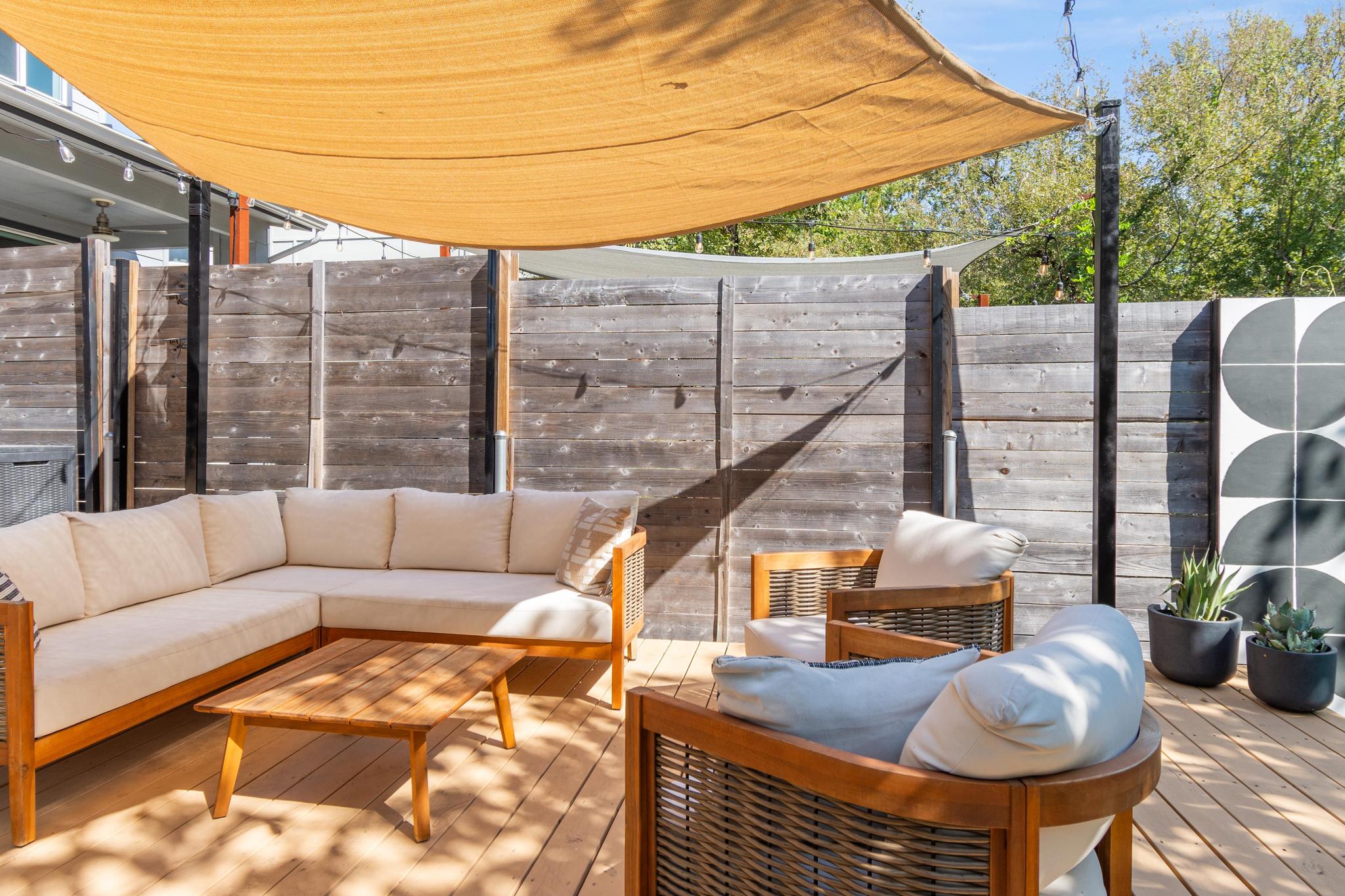 1177 Pandora Street, Unit B Austin, TX 78702 - Photo 25 of 30 Wooden deck with a fenced backyard and an outdoor lounge area