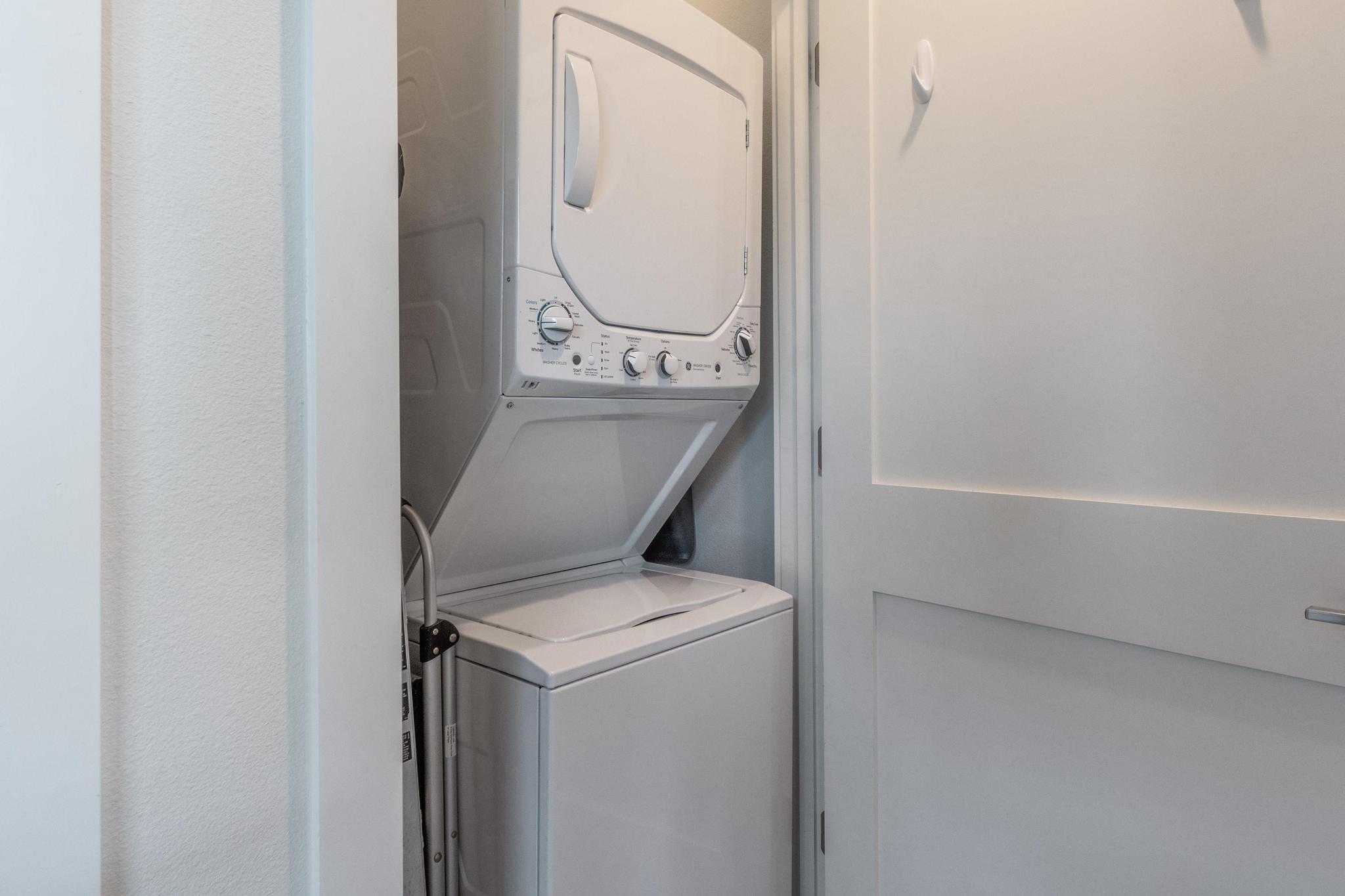 1177 Pandora Street, Unit B Austin, TX 78702 - Photo 8 of 30 Laundry area with stacked washer / dryer