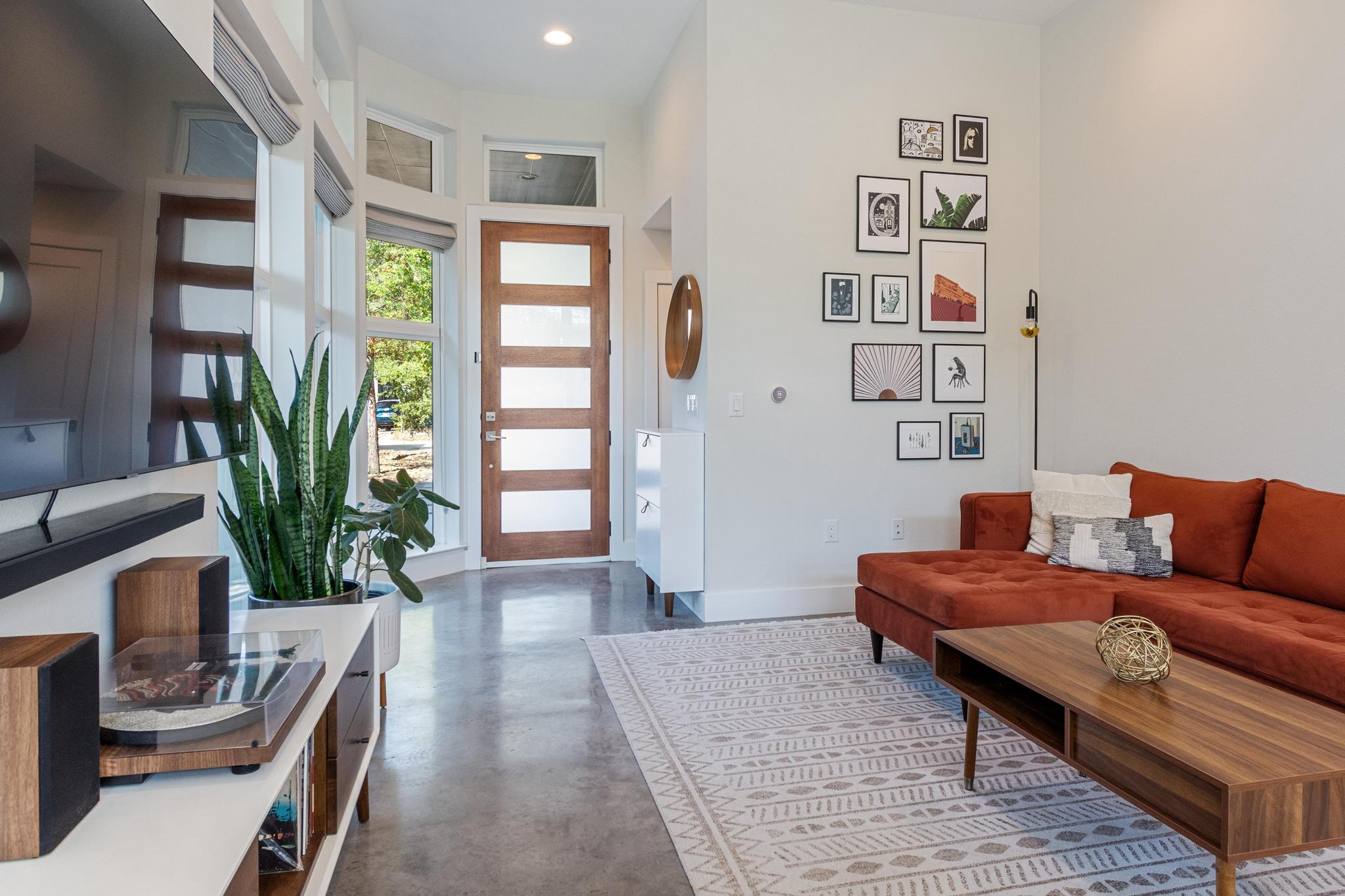 1177 Pandora Street, Unit B Austin, TX 78702 - Photo 10 of 30 Living room featuring concrete floors and recessed lighting