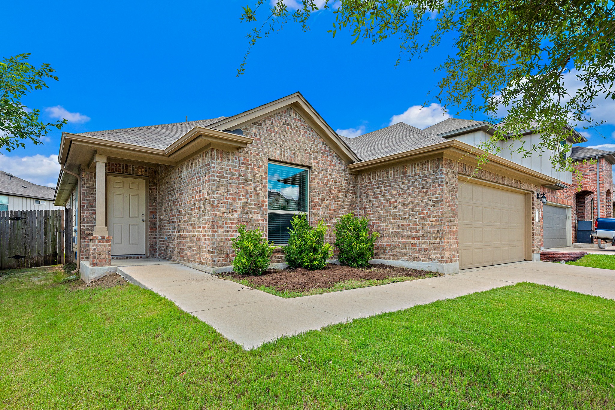 382 Limerick Road Buda, TX 78610 - Photo 2 of 20 A classic brick exterior offers enduring curb appeal and a welcoming facade for this charming residence.