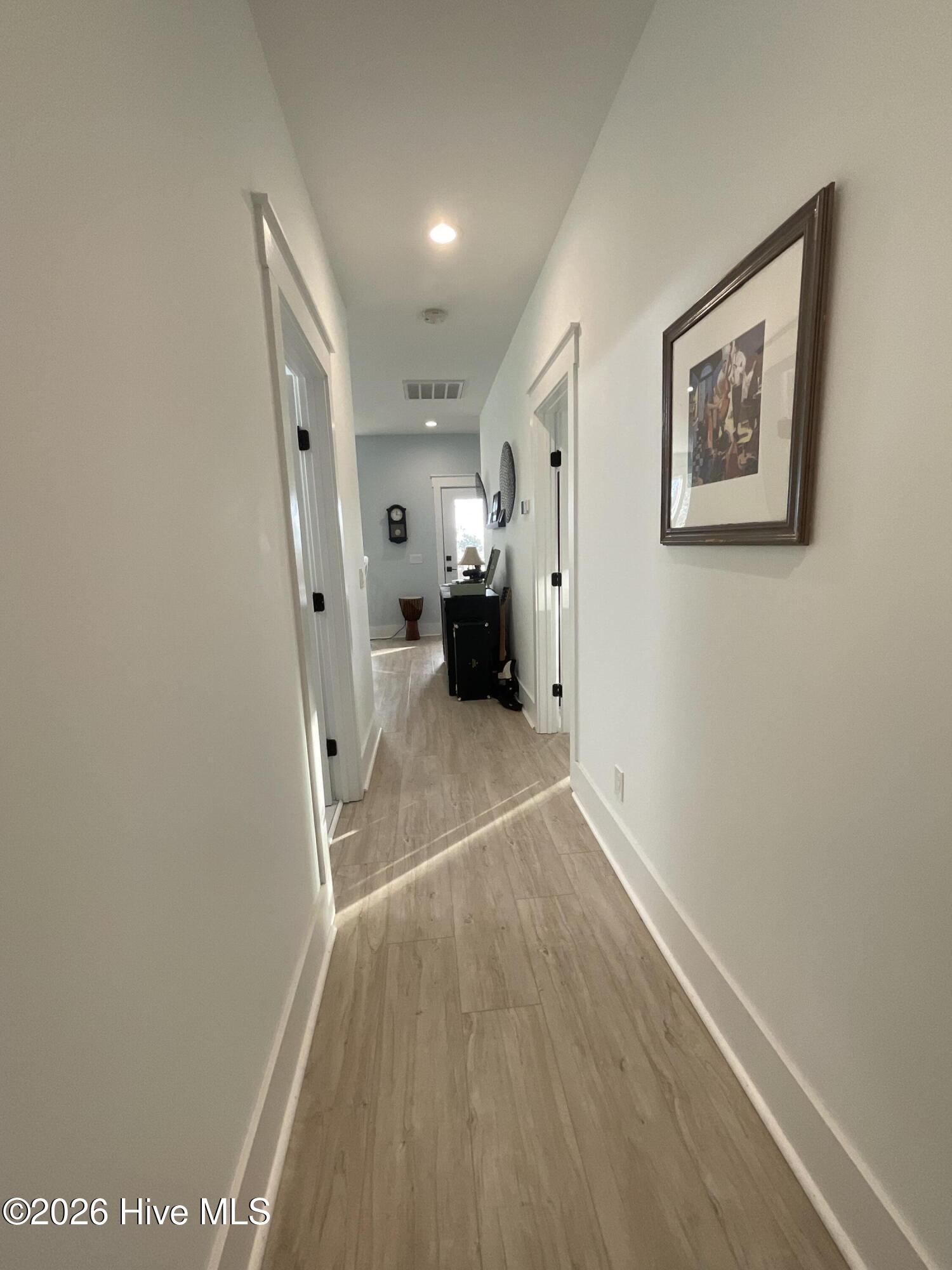 2659 Seashore Road Southwest Supply, NC 28462 - Photo 31 of 77 3rd floor hall access to back deck