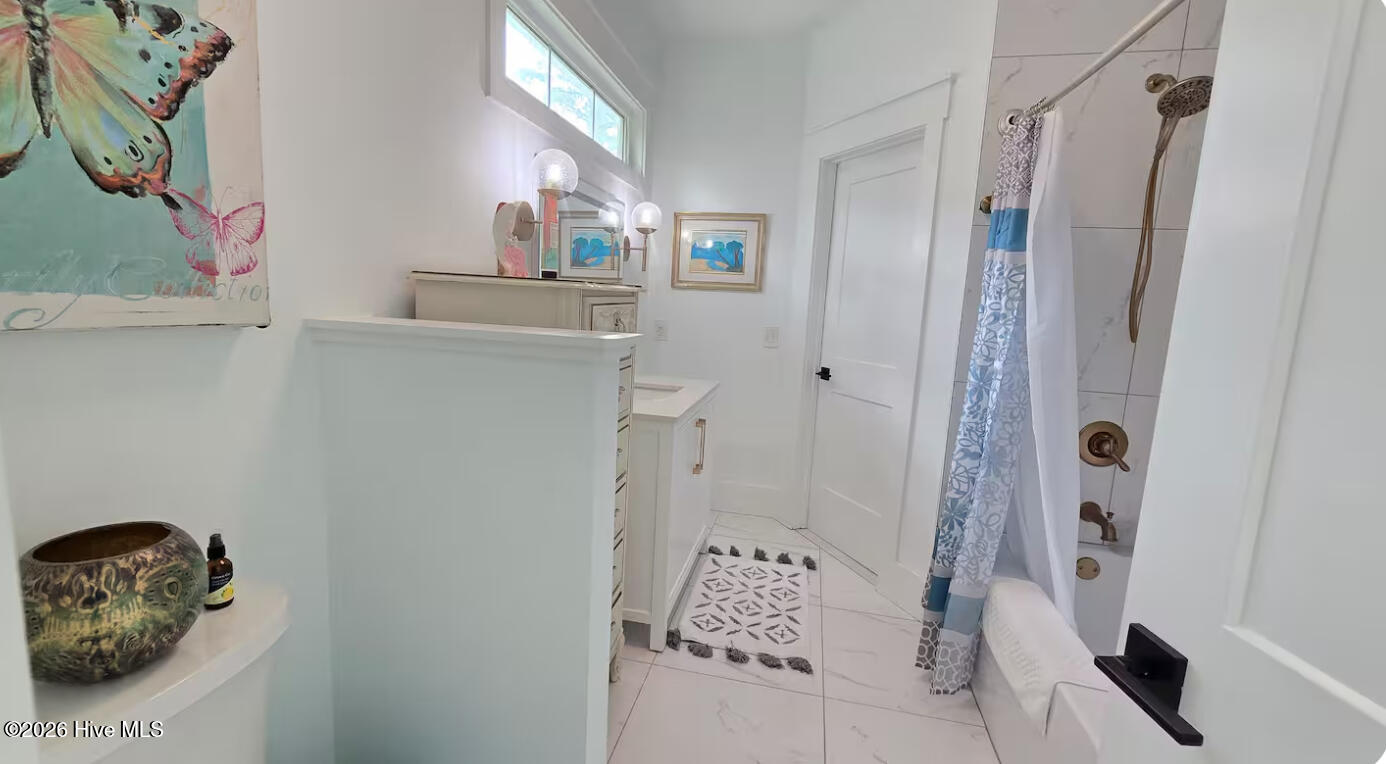 2659 Seashore Road Southwest Supply, NC 28462 - Photo 35 of 77 Jack and Jill bath ...every room has a view of water:)