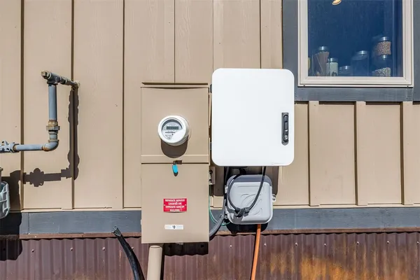 a view of washer and dryer with wooden floor