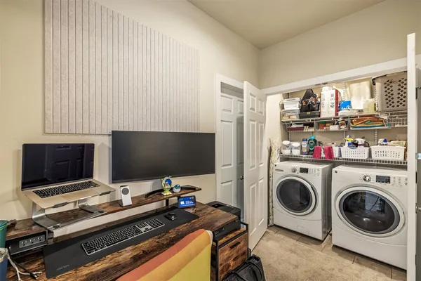 a room with furniture and a flat screen tv