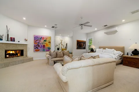 a bed room with a bed and a book shelf