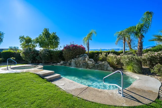 a view of a garden with a houses