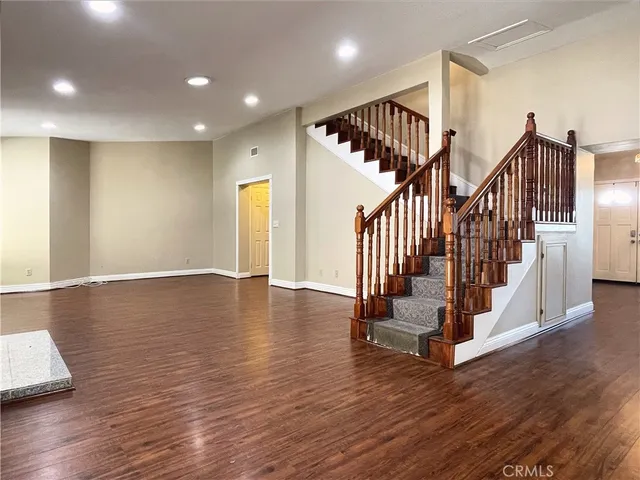 a view of entryway with wooden floor