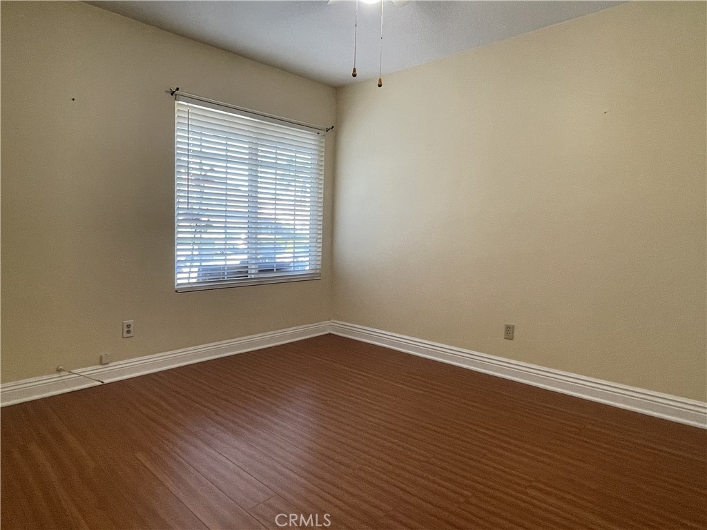 20665 Fuero Drive Walnut, CA 91789 - Photo 25 of 47 an empty room with wooden floor and windows