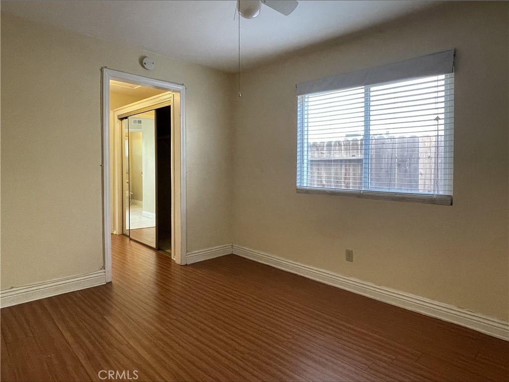 20665 Fuero Drive Walnut, CA 91789 - Photo 27 of 47 an empty room with wooden floor and windows